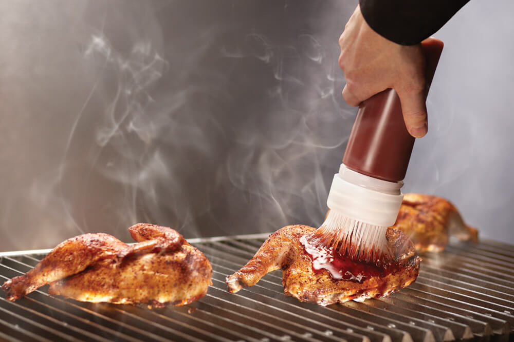 Dispense and brush BBQ sauce at the same time with a squeeze bottle – this changes everything!