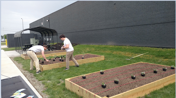 Volunteers ready the beds.