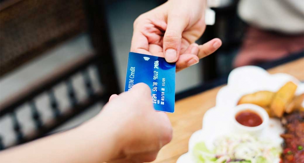 Is going cashless discrimination? Is it ok to charge a fee for using a credit card?