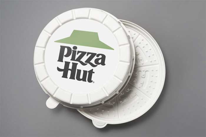 Pizza Hut's experimental round box, complete with a special green roof logo.