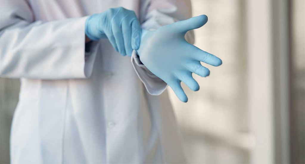The proper method for removing gloves for restaurant and foodservice workers