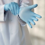 The proper method for removing gloves for restaurant and foodservice workers