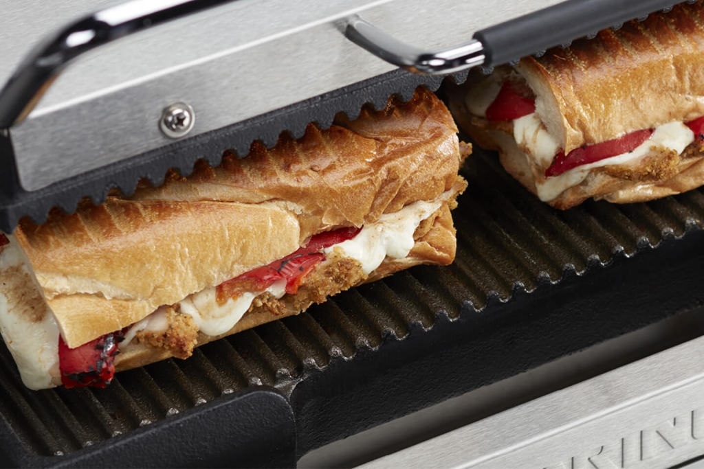 Ribbed plates of a Waring Commercial panini grill.