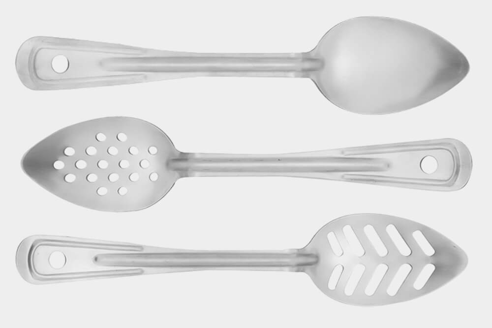 Solid, perforated, and slotted serving spoons by Vollrath for bakeries.