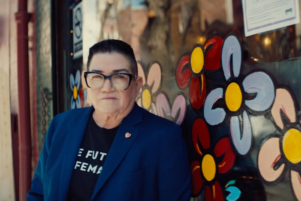 Lea DeLaria stands in front of NYC's Cubbyhole.