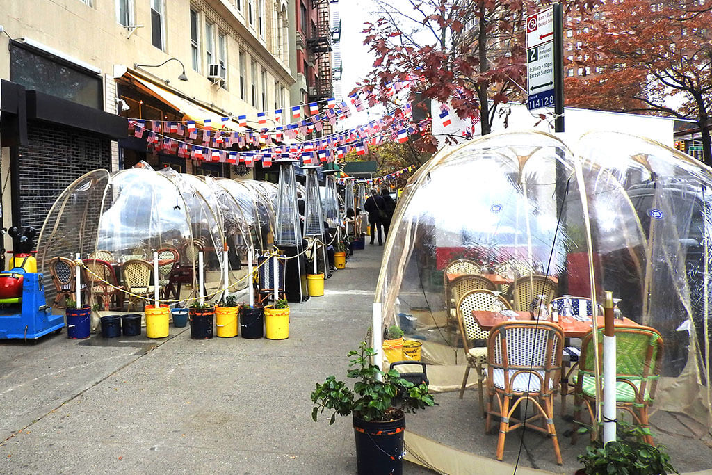 Bubbles line the street outside of Cafe du Soleil in Manhattan.