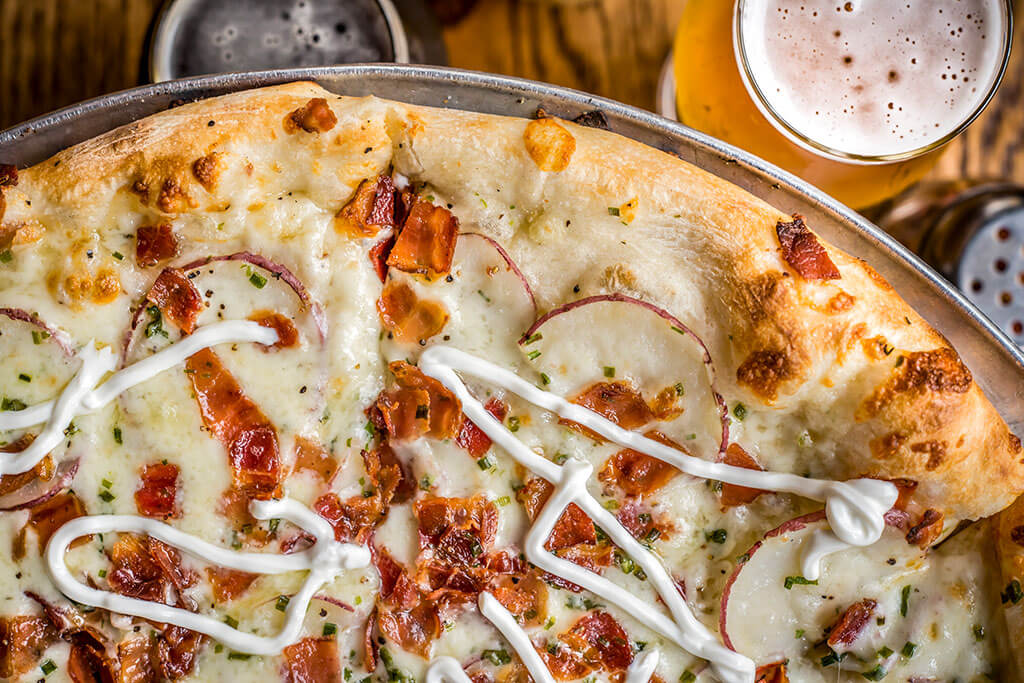 Food photography is most effective when incorporating various elements of your restaurant into the shot.