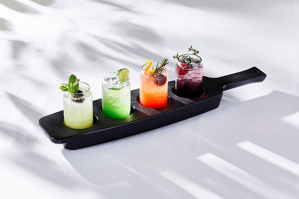 Matte Black Flight Paddle by Libbey The Matte Black Flight Paddle by Libbey securely transports glasses with effortless style. Pair with Libbey’s Clear 5 Ounce Glass Can Taster for a modern eclectic display. Tasting flights are a great way to introduce your guests to tequila and mezcal.