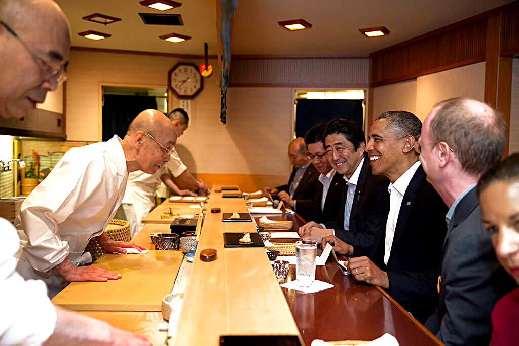 President Barack Obama and Prime Minister Shinzo Abe dine at the world-famous Sukiyabashi Jiro with the now 97-year-old owner and sushi master Jiro Ono (pictured center). This formerly Michelin 3-starred restaurant was featured in the documentary Jiro Dreams of Sushi. 