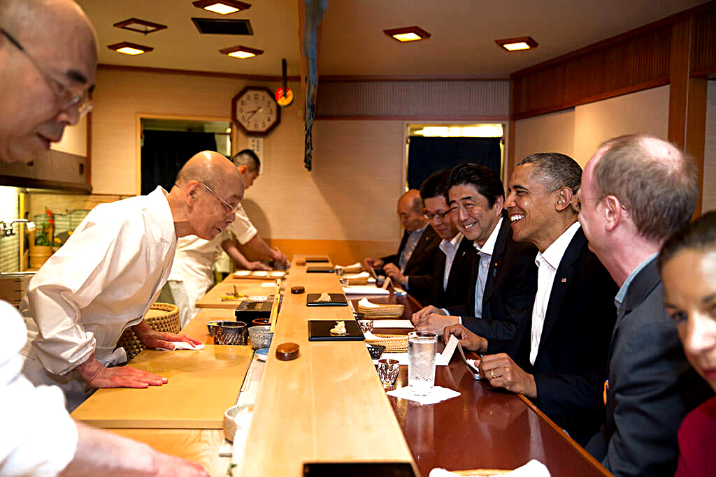 Barack Obama Shinzo Abe Jiro Ono at Sukiyabashi Jiro President Barack Obama and Prime Minister Shinzo Abe dine at the world-famous Sukiyabashi Jiro with the now 97-year-old owner and sushi master Jiro Ono (pictured center). This formerly Michelin 3-starred restaurant was featured in the documentary Jiro Dreams of Sushi.