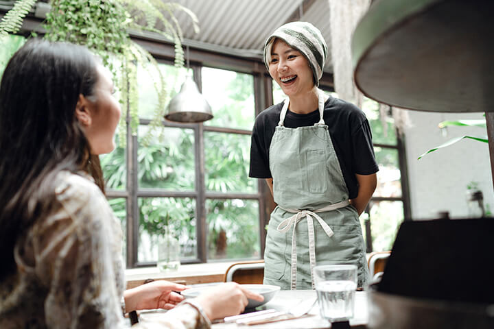 A happy waitress.