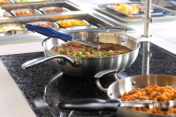 The Miramar Fry Pan by Vollrath is made with durable 3-ply construction for high-volume usage. Even heat distribution and a unique design allows you to save time by cooking and serving from the same unit.  