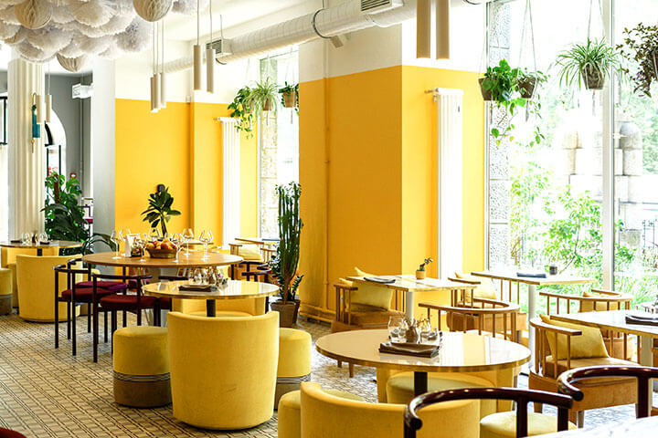 Yellow is a bright and cheery color when used in restaurant design. 