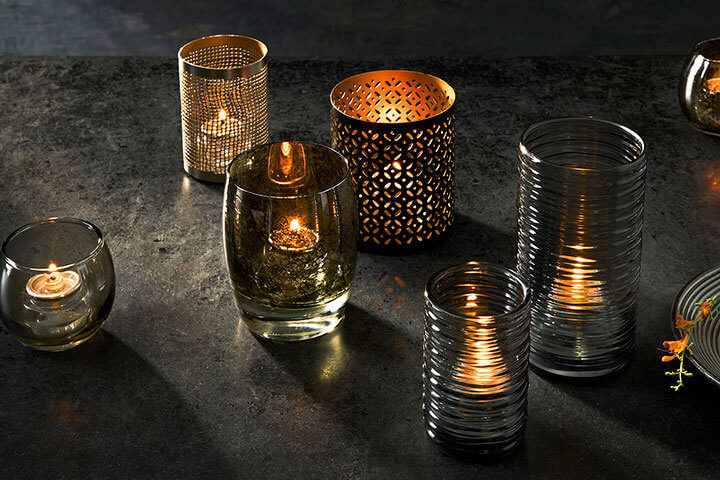 A variety of candles and candle holders from Hollowick.