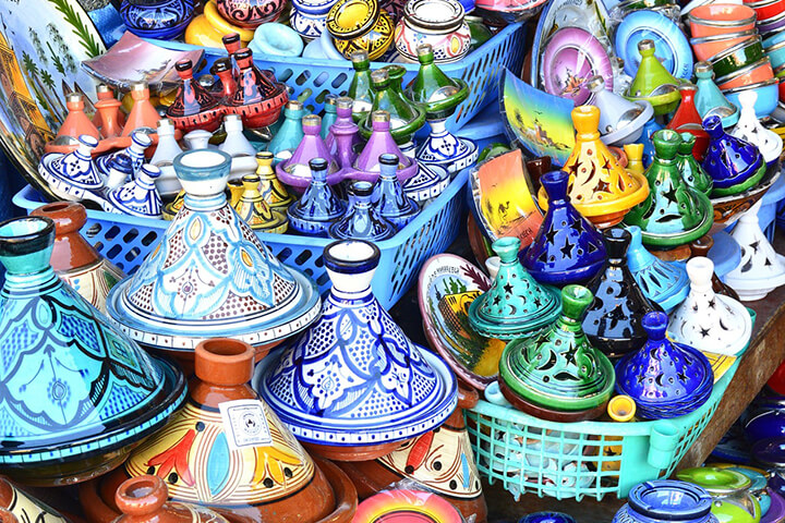 Tagines displayed at a market.