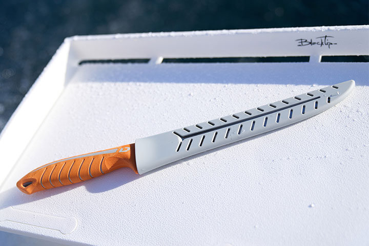 Flip the handle of a Dextreme fillet knife and use the lower edge for precision work.