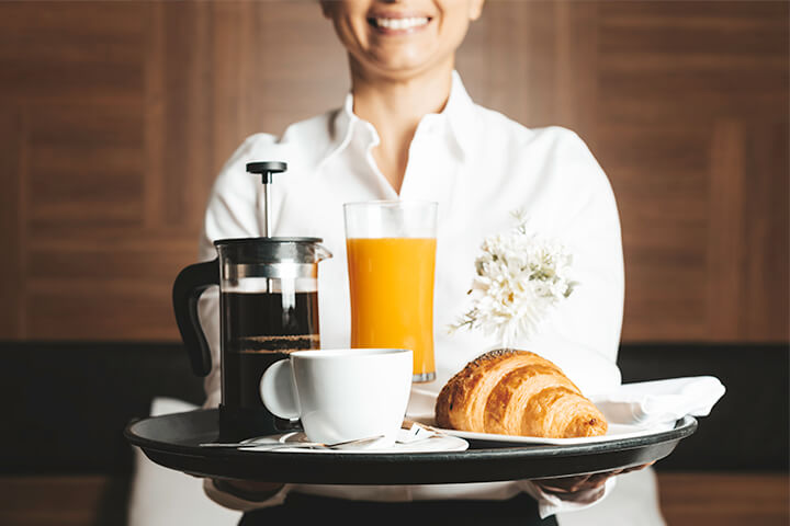 This personalized breakfast includes: organic, slow-pressed orange juice; sprouted, low-carb KETO bread; fair-trade coffee with low acidity levels; (not pictured) vanilla bean oat milk coffee creamer.