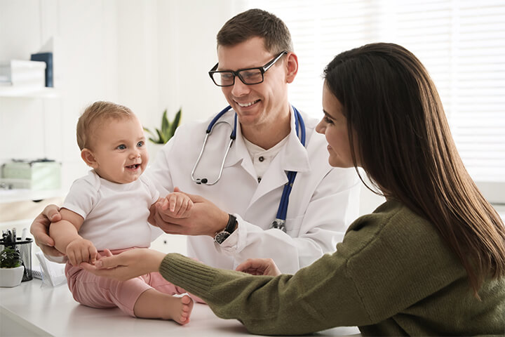 Restaurant employee brings her baby to the doctor.