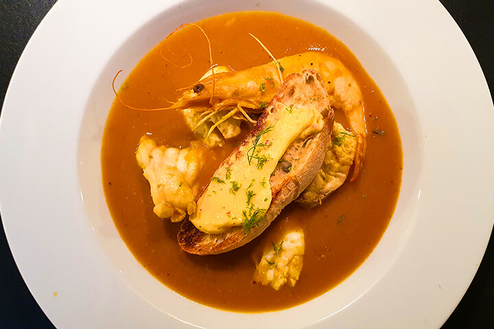 Bouillabaisse is a classic Provençal fish stew that traditionally includes saffron as a key ingredient.