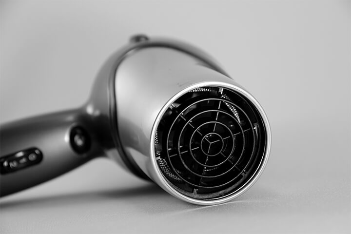 The heat from a hair dryer also aids in removing stickers.