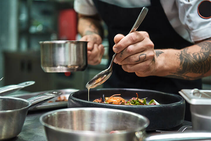 A chef prepares food.