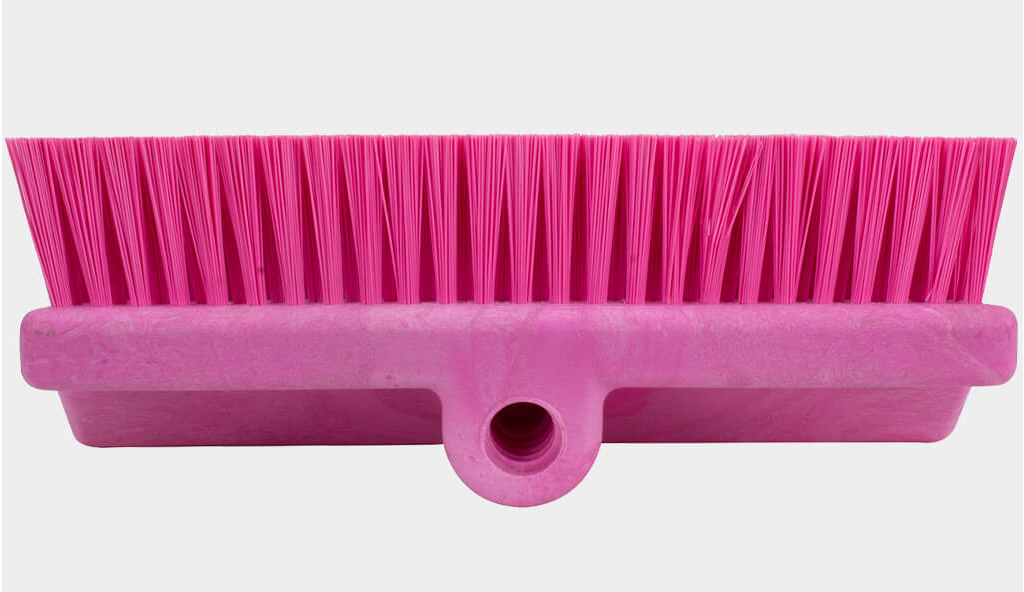 A pink color-coded cleaning tool.