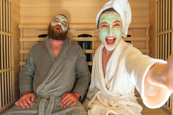 Two people enjoy their staycation time in a spa.