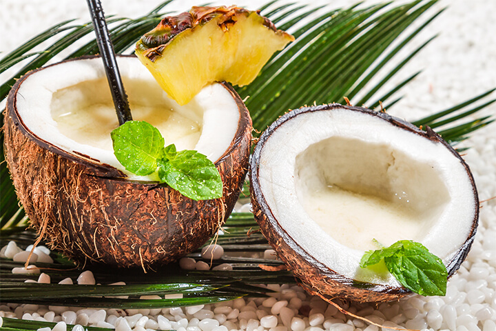 Pina colada served in a coconut.