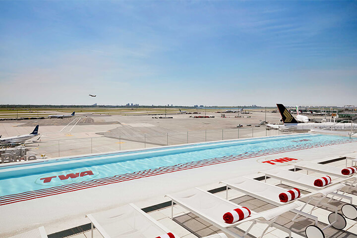 Adaptive reuse has reignited the magic of Eero Saarinen’s landmark 1962 TWA Flight Center at JFK Airport, restoring and reimagining it as the TWA Hotel. Pictured is the rooftop pool, open all year round.  