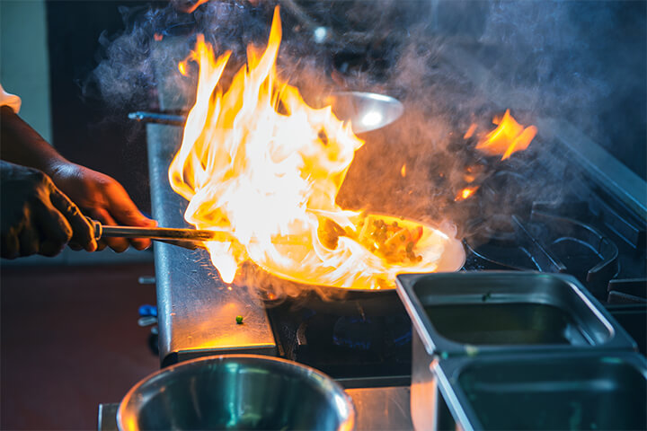 Successful open kitchens require well-designed layouts for smooth operation and flow, and a focus on maintaining a clean and professional environment.