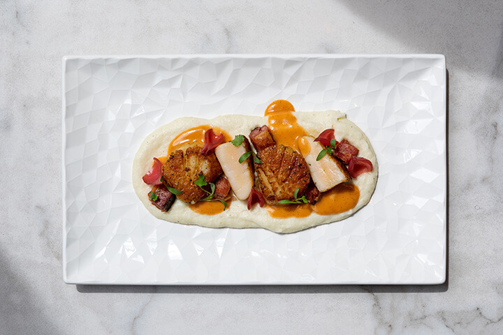 Status by Libbey features geometric, faceted surfaces for a fresh, chic aesthetic, elevating the intrigue and personality of white dinnerware.