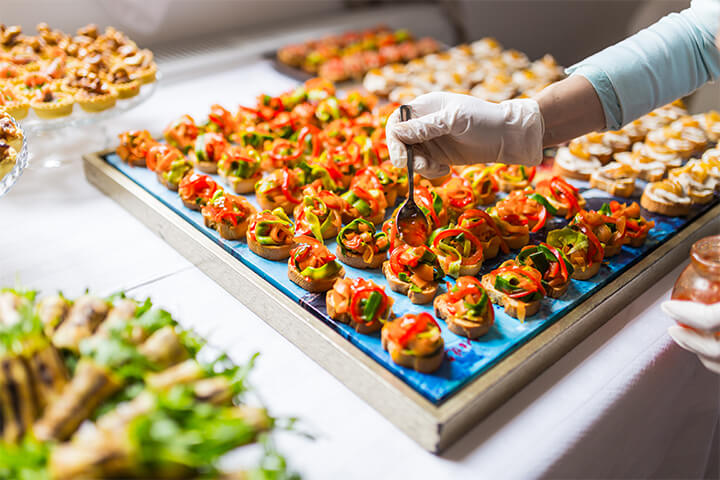 A chef prepares a course. 