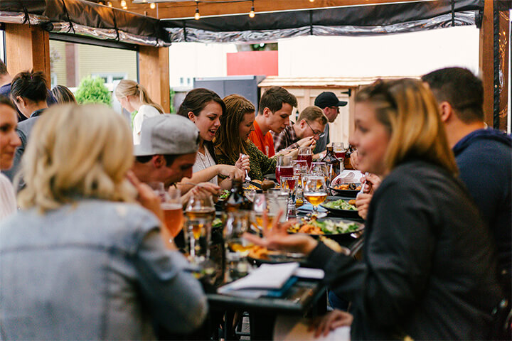 An active room of happy diners. 