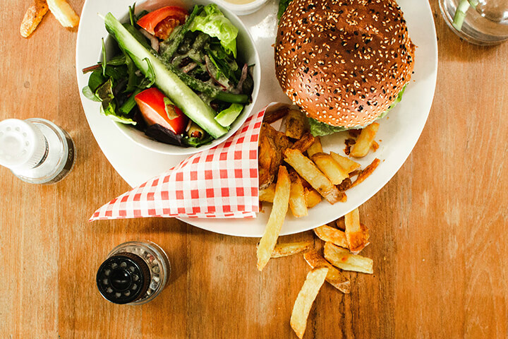 Fries, salad, and burger. 