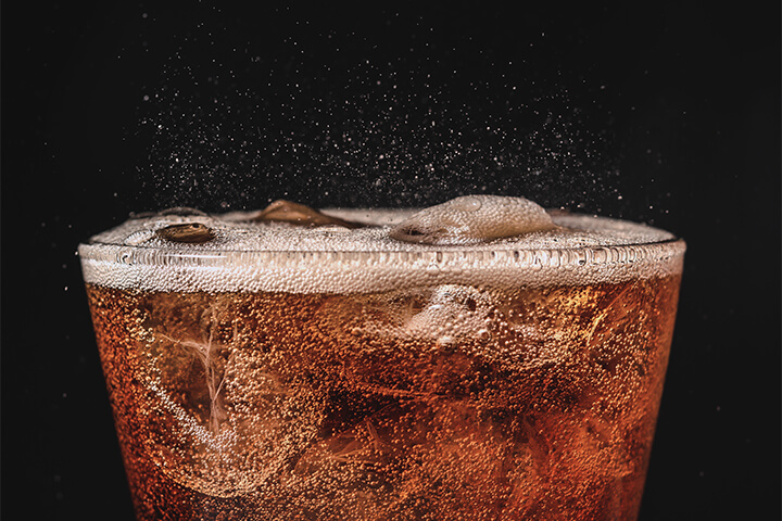 Lots of bubbles in a softdrink.
