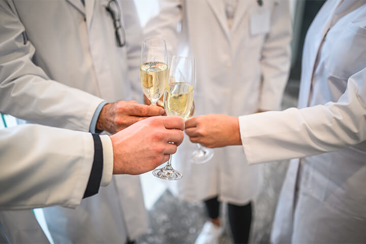 Scientists toast to their awesome work with bubbles.