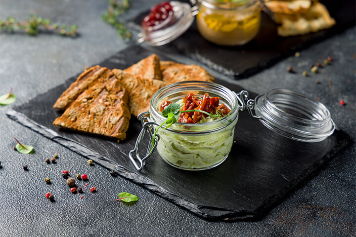 Avocado espuma with sundried tomatoes.