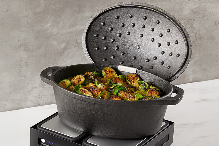 Heavy-duty Cast Iron Casserole Pot goes straight from oven to table and elevates the look of stations and buffets.
