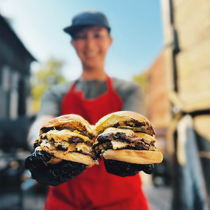 Two burgers that look really good.