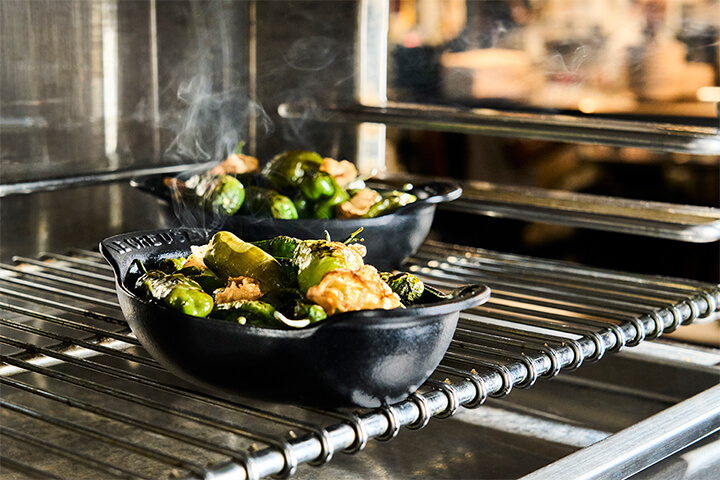 Le Creuset's Gourmand collection, seen in a stove.