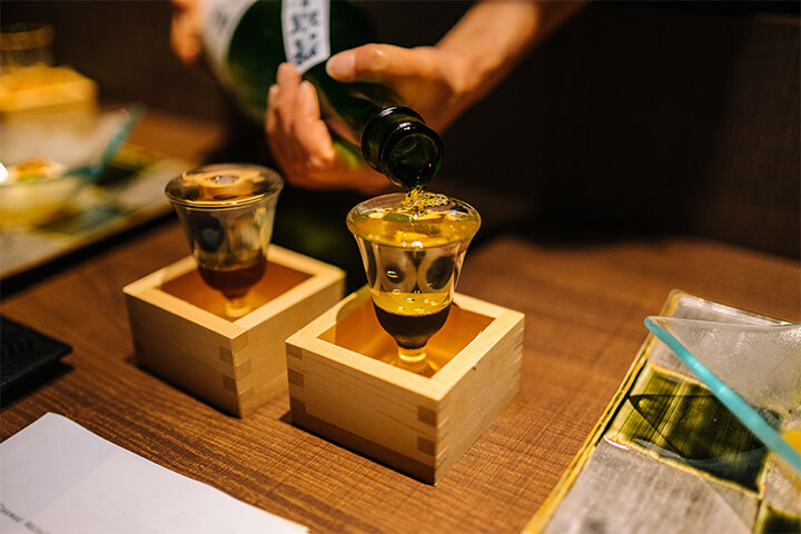 Overflow sake and masu.