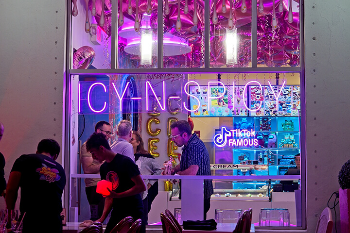 Icy-N-Spicy neon illuminated shop window in the heart of the art deco district, Miami Beach Florida.