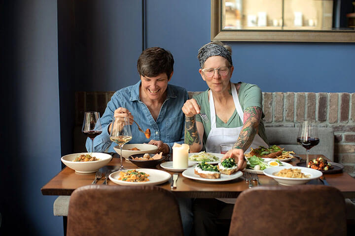 The owners of il seme enjoy food. 