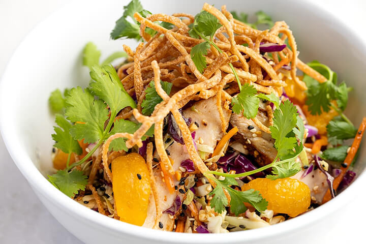 Hilltop's food is simple and nourishing: breakfast and lunch offerings, along with coffee, juices, and pastries. Shown above: Sesame Chicken Salad.