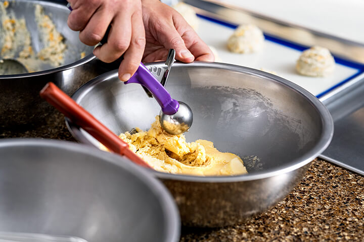 Vollrath mixing bowls, scoopers, and sheet pans